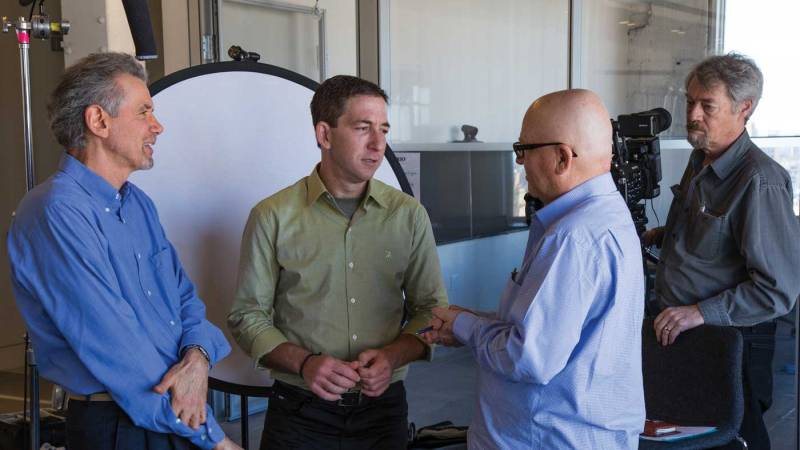 Pictured from left to right, Jeff Cohen, Glenn Greenwald, Fred Peabody and John Westheuser trade ideas on location for “All Governments Lie”