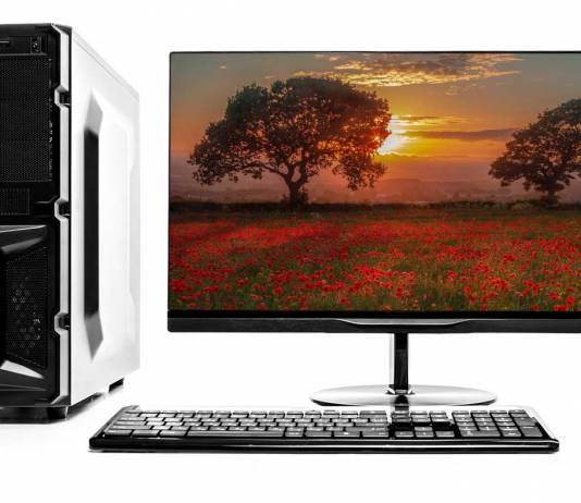 Desktop computer, monitor, keyboard and mouse against a white background.