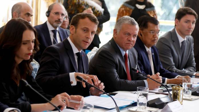 FRANCE-NZEALAND-POLITICS-ATTACKS-INTERNET New Zealand's Prime Minister Jacinda Ardern (L) and French President Emmanuel Macron (C-L) attend a launching ceremony for the 'Christchurch call',