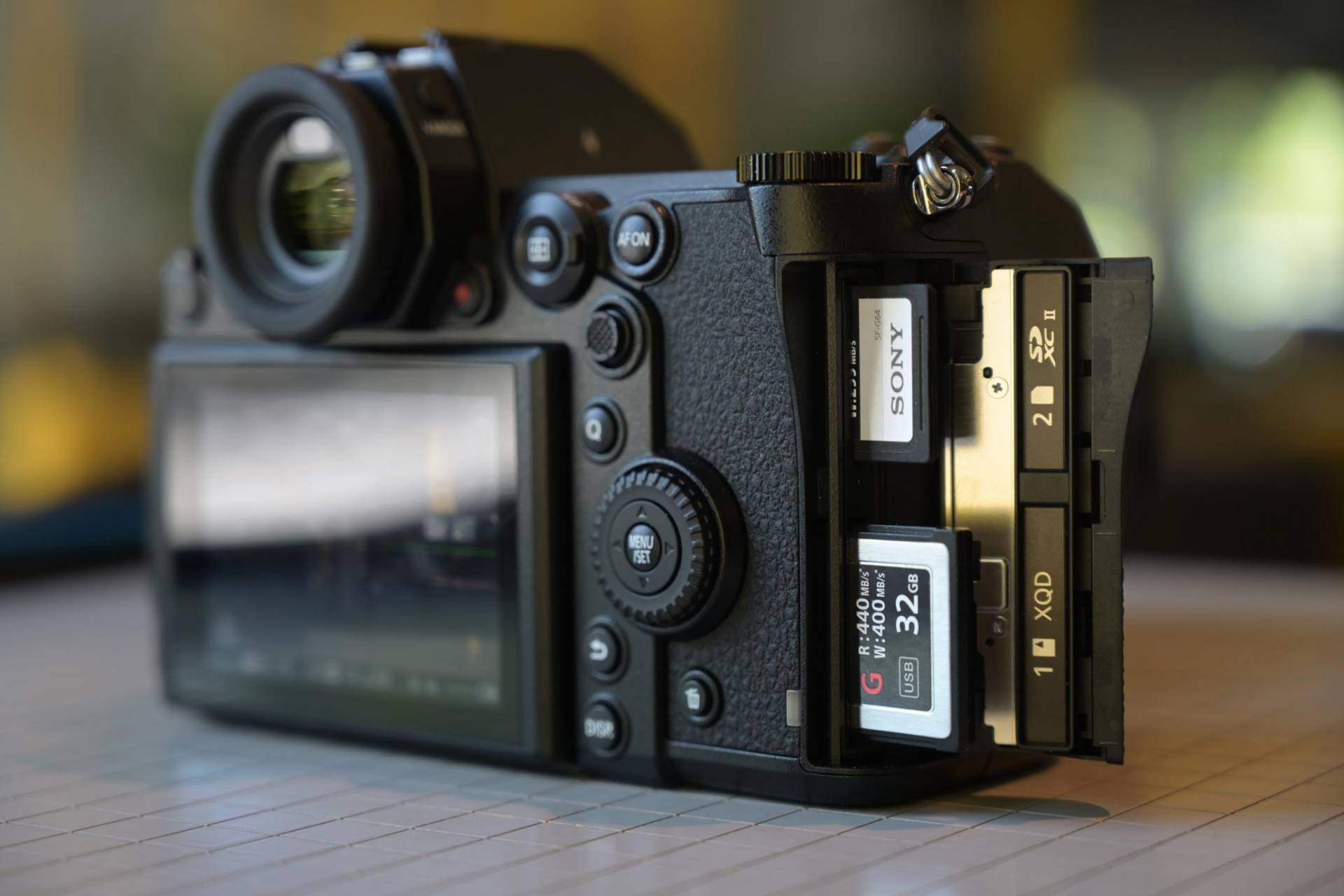 Pansonic Lumix S1 review - three-quater rear view of camera with card slots open