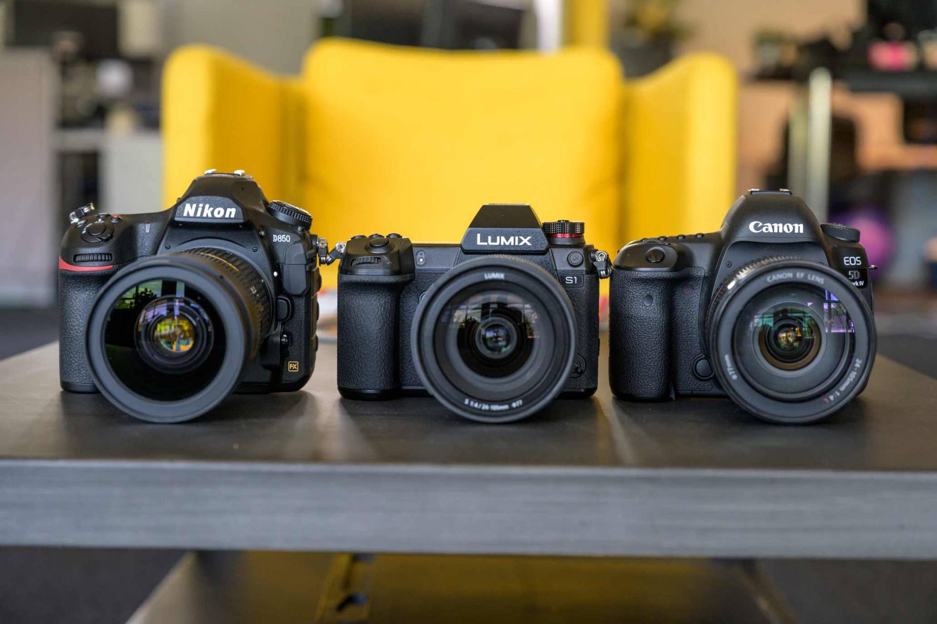 Nikon D850, Pansonic Lumix S1 and Canon 5D Mark IV in a row showing comparable sizes