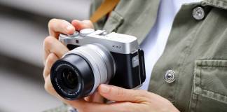 Fujifilm X-A7 being held