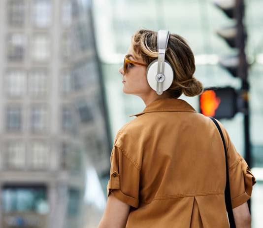 Momentum Wireless headphones being worn in the streets of a city