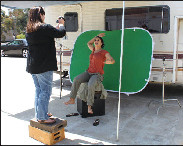 Figure 2: Since the stairs on the background plate were shaded, we shaded our actor when we shot the green screen. We also made our character lean backwards so her hair and earrings would fall in a natural manner.