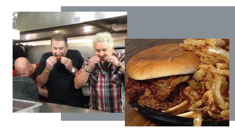 Guy tasting hot wings and a hamburger dish