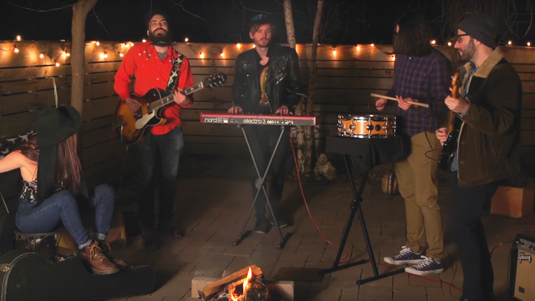 Master shot of the band on the patio