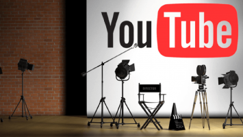 YouTube logo behind a studio set